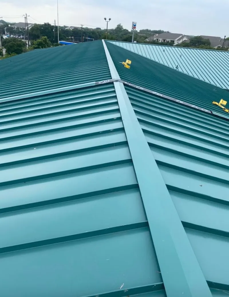 Green commercial metal roof ridge and valley for Metal Roof Repair in Scituate